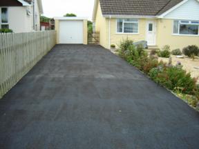 Resurfacing drive with dense bit Mac wearing course,